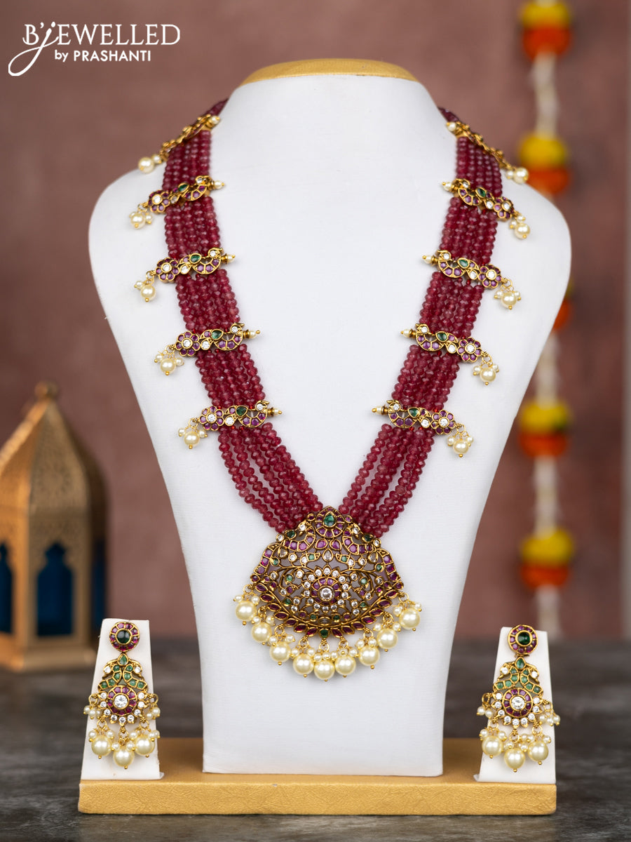 Beaded multilayer maroon necklace with kemp & cz stones and pearl hangings in victorian finish
