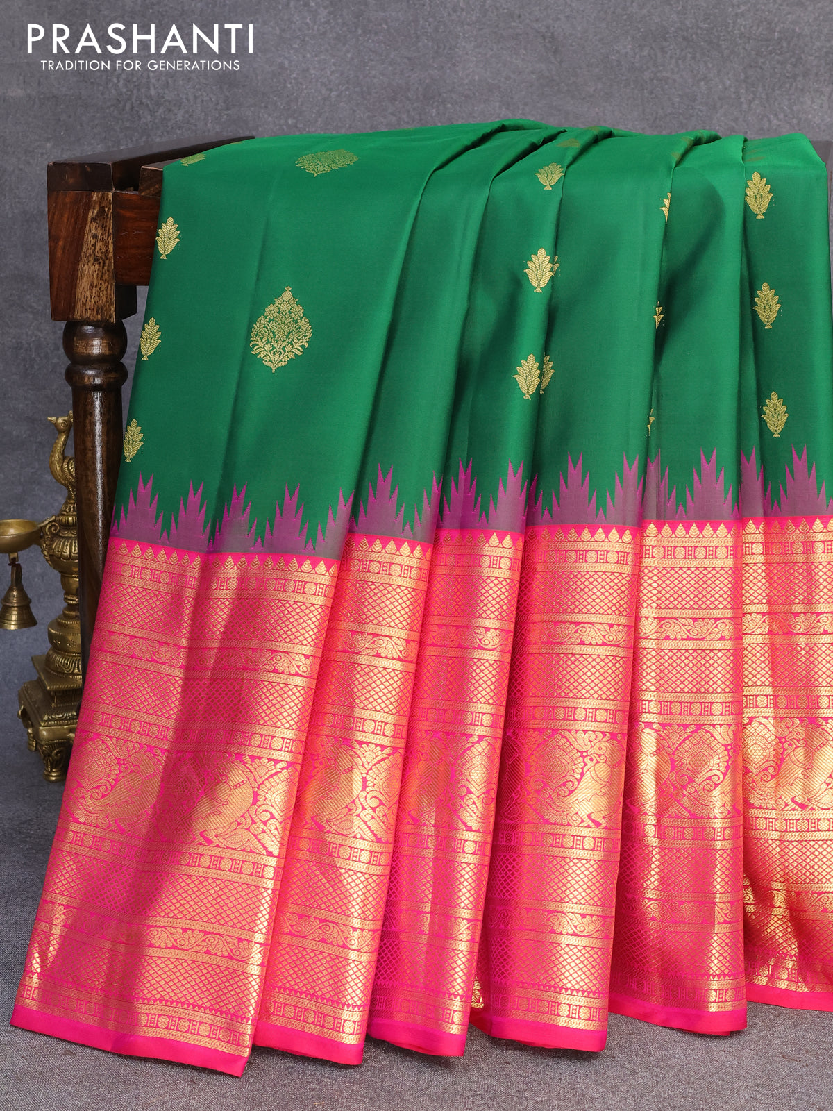 Pure gadwal silk saree green and pink with zari woven buttas and temple design long zari woven border