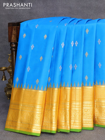 Pure gadwal silk saree cs blue and yellow with zari woven buttas and long zari woven border