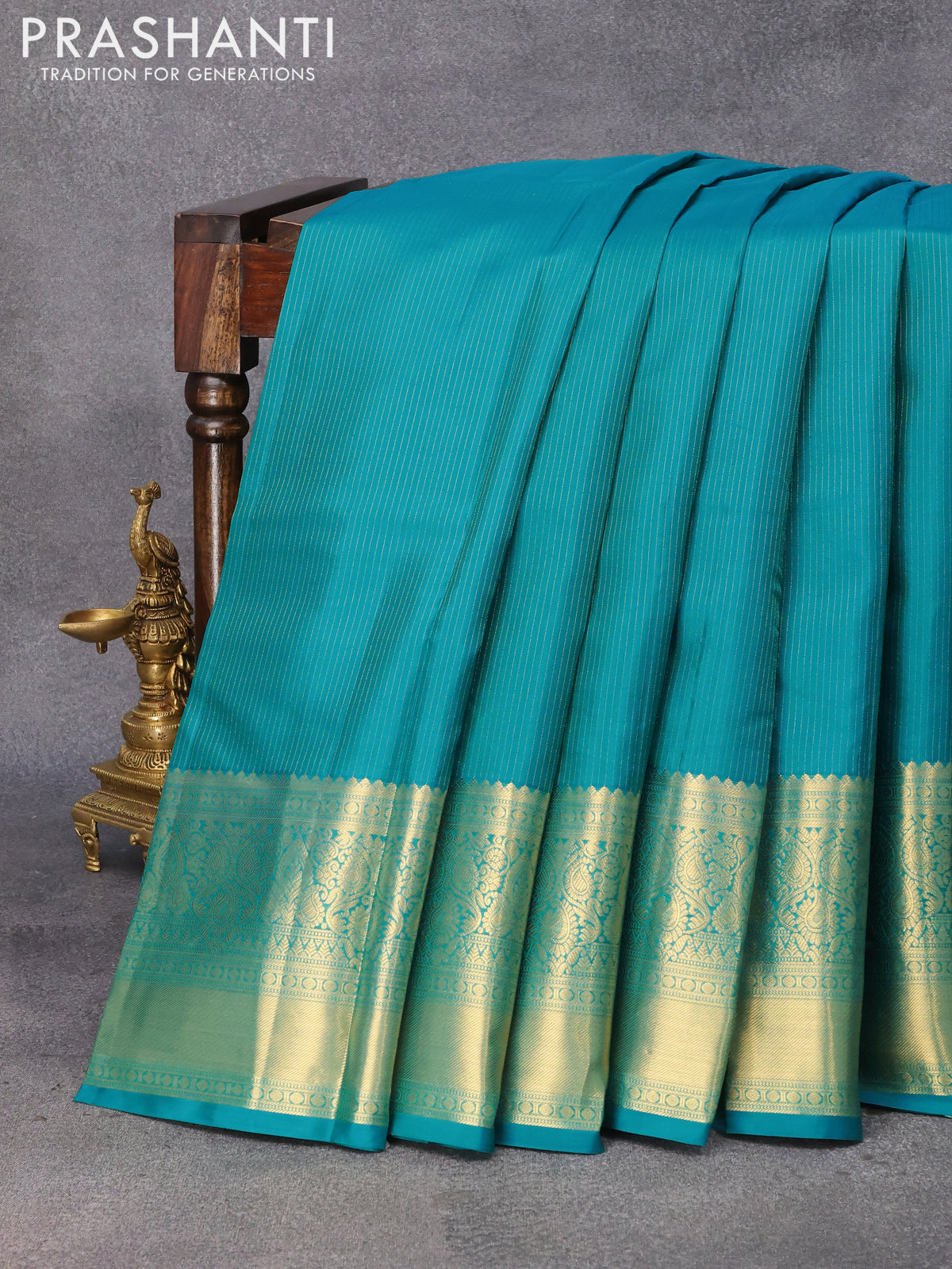 Pure kanjivaram silk saree teal blue and purple with allover zari weaves and long zari woven border & Allover wevaes