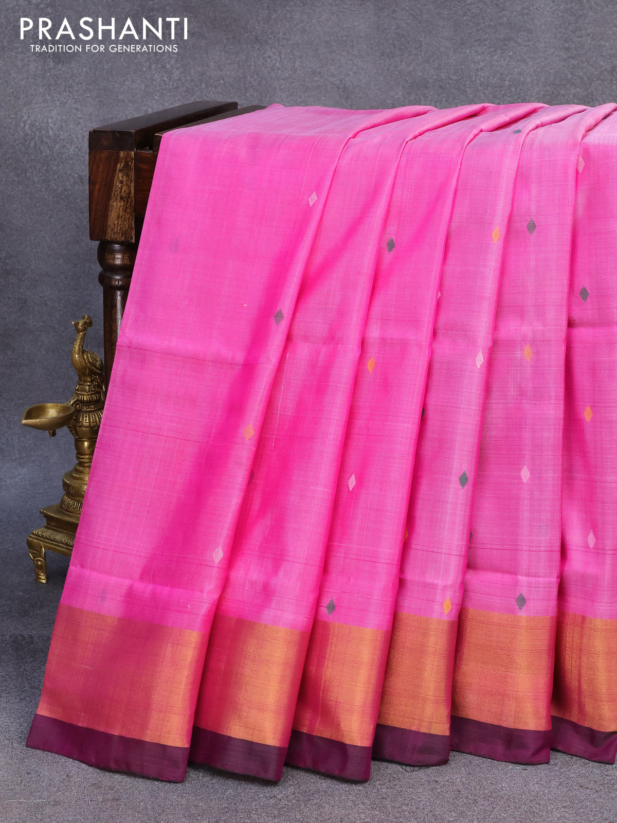 Pure uppada silk saree pink and deep jamun shade with allover thread woven geometric buttas and zari woven border