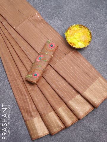 Semi tussar saree dark sandal with allover zari weaves and zari woven border & embroidery work blouse