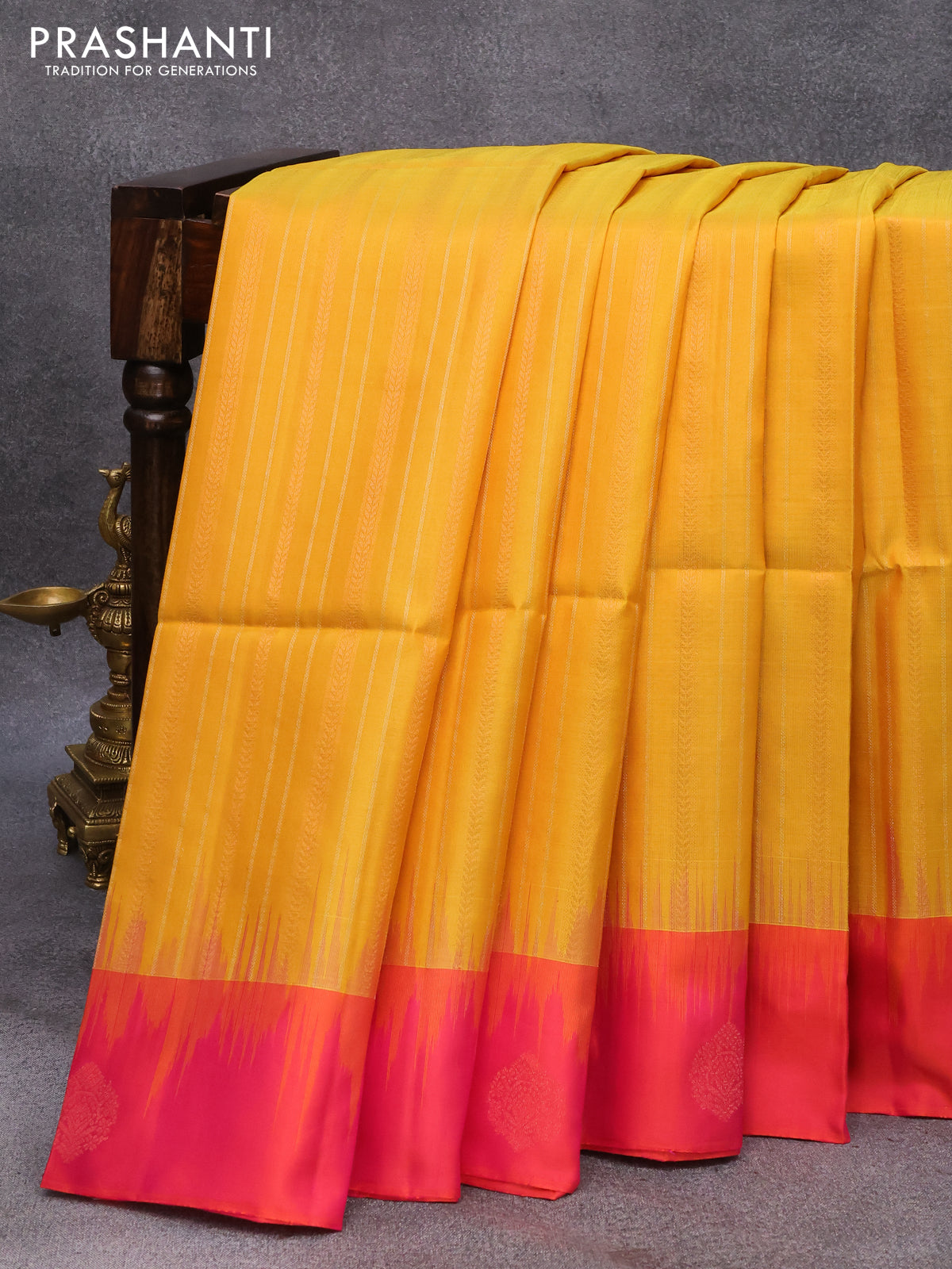 Pure soft silk saree mango yellow and dual shade od pinkish orange with allover silver & copper zari weaves and silver & copper zari woven butta border