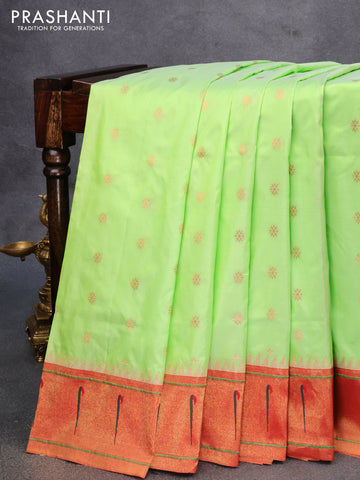 Pure paithani silk saree fluorescent green and red with allover zari woven floral buttas and zari woven paithani butta border