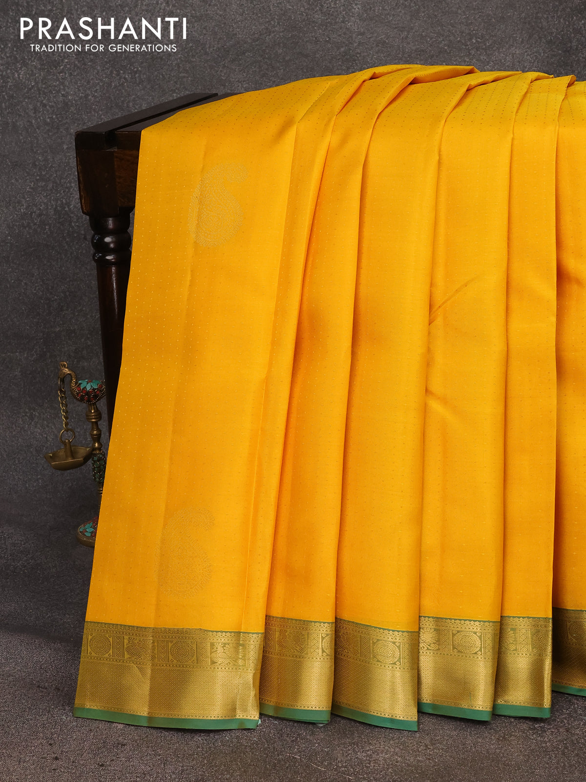 Pure kanjivaram silk saree yellow and teal green with allover self emboss & buttas and zari woven border