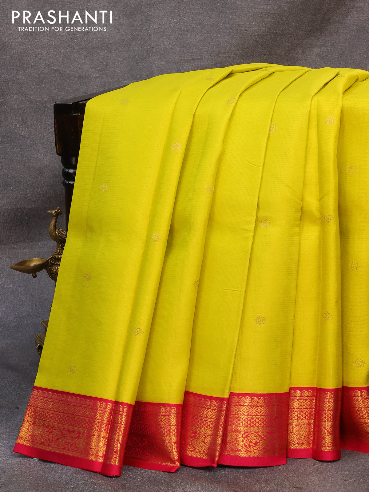 Pure kanjivaram silk saree lime yellow and pink with allover zari weaves & floral buttas and zari woven annam korvai border