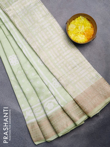 Semi gadwal saree pista green with geometric butta prints and zari woven border