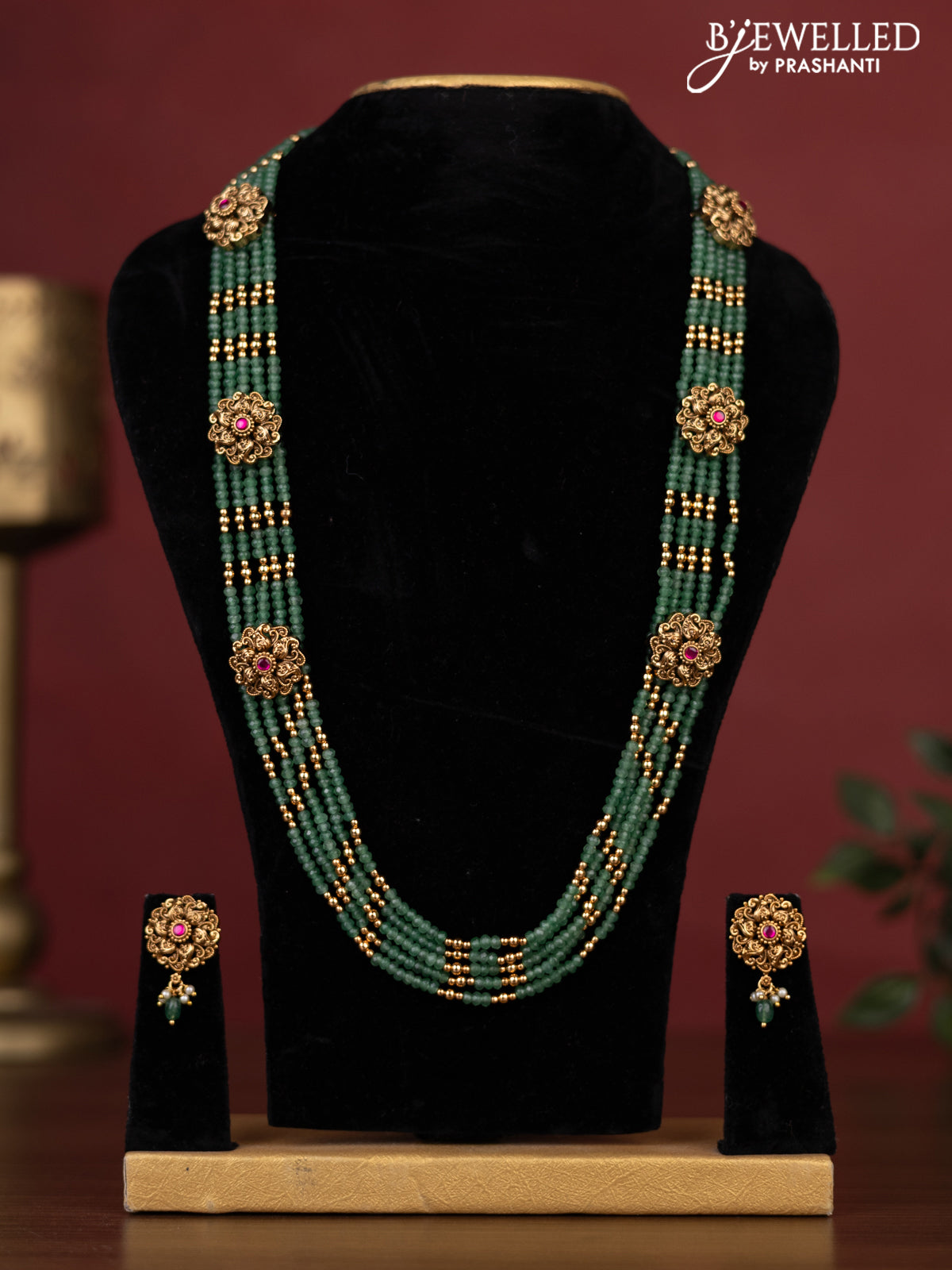 Antique beaded green haaram with side pendant and pink kemp stone