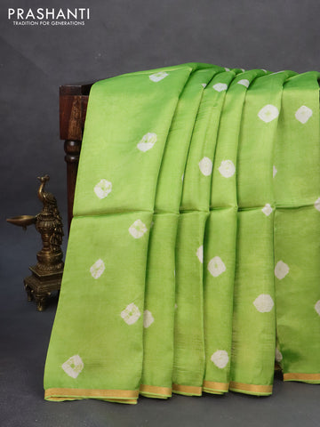 Banana silk saree light green with batik butta prints and small zari woven border