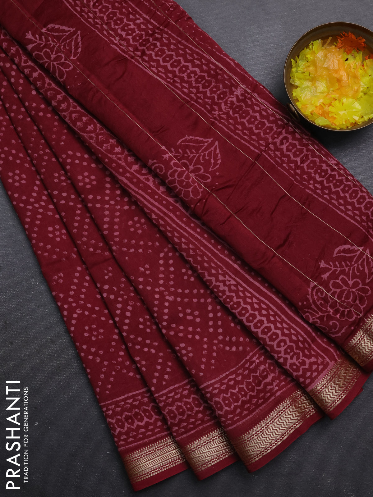 Chanderi bagru saree maroon with allover prints and maheshwari border