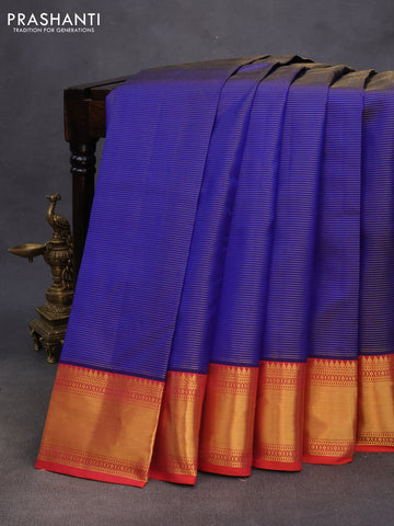 Pure kanchipuram silk saree blue and orange with allover zari stripe pattern and rich zari woven border