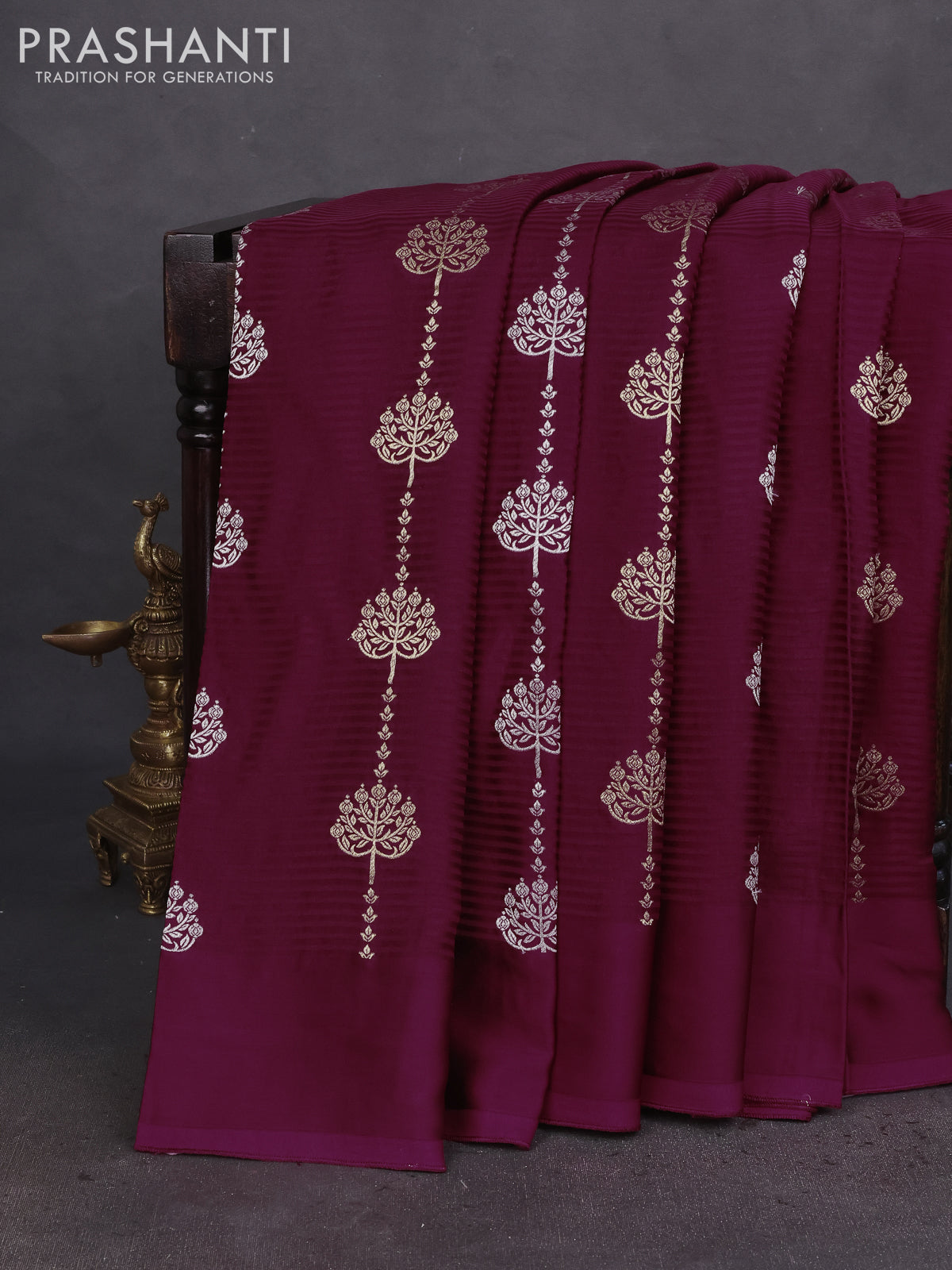 Banarasi mushru silk saree maroon with allover stripes pattern & zari buttas and satin border