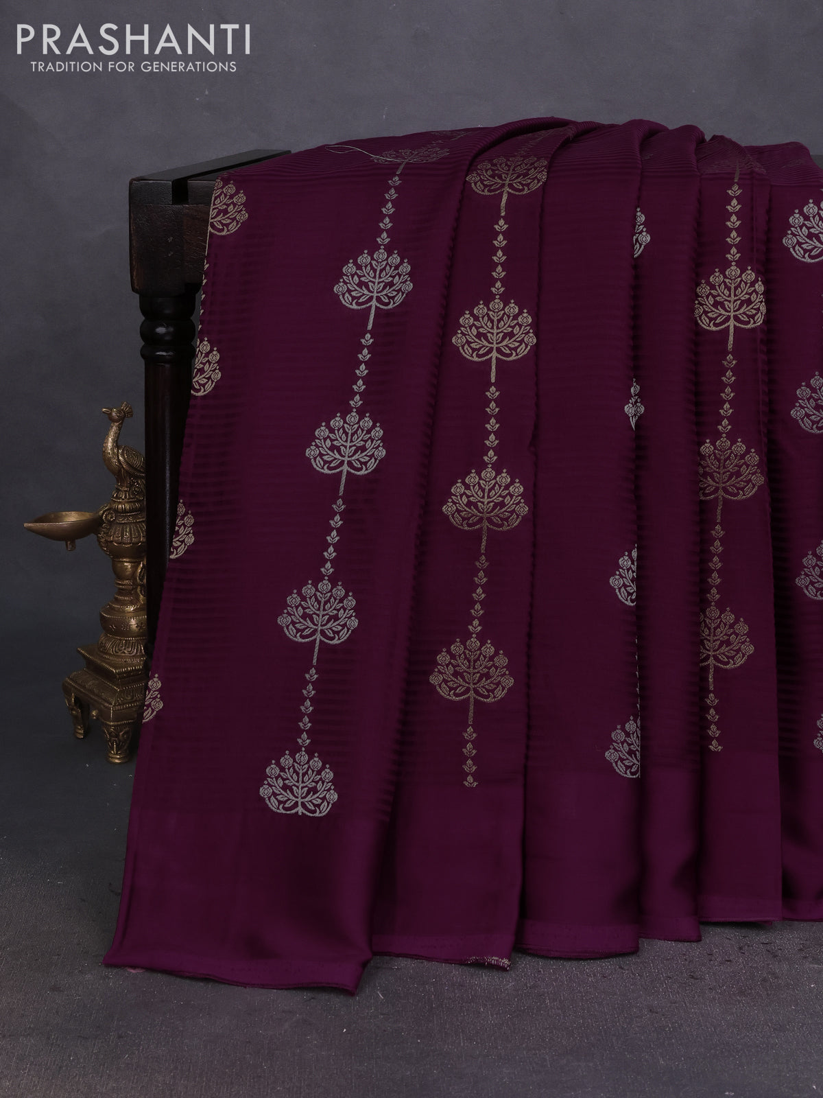 Banarasi mushru silk saree wine shade with allover stripes pattern & zari buttas and satin border