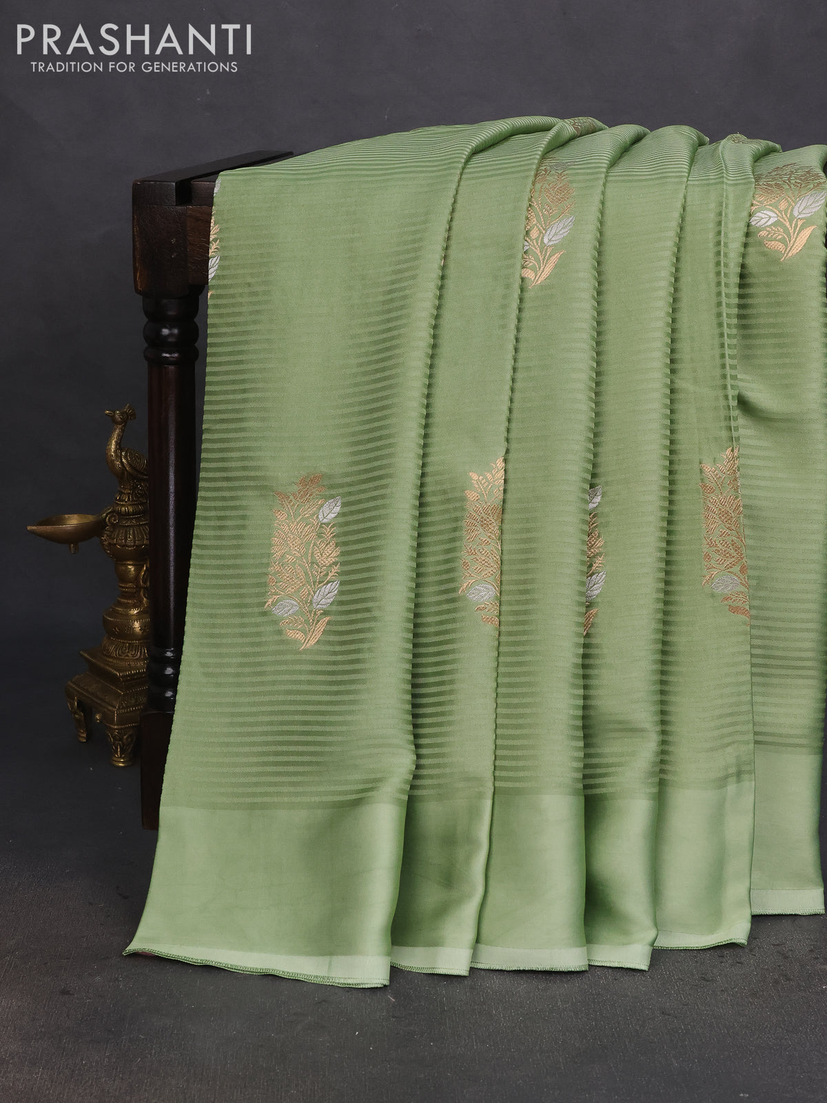 Banarasi mushru silk saree pastel green with allover stripes pattern & zari weaves and satin border