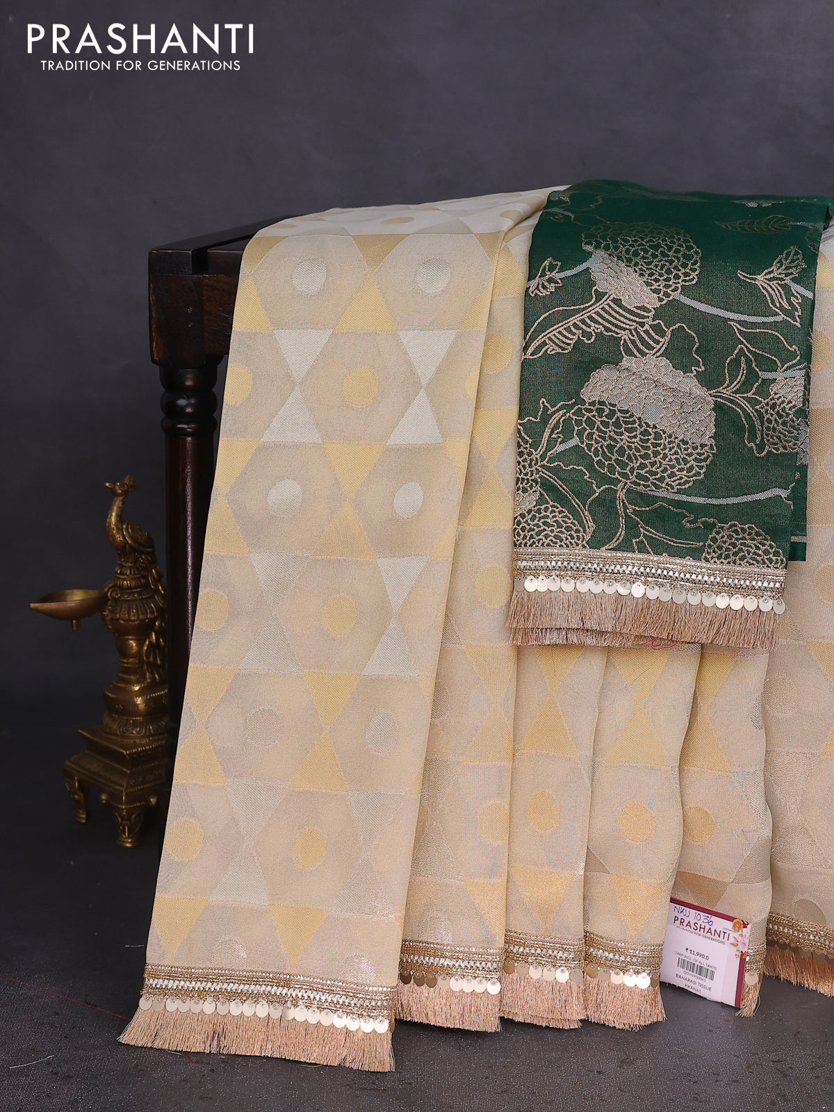 Banarasi tissue saree beige and dark green with allover zari woven geometric wevaes and lace work border