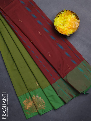 Arani semi silk saree sap green and green with copper zari woven buttas and copper zari woven butta border
