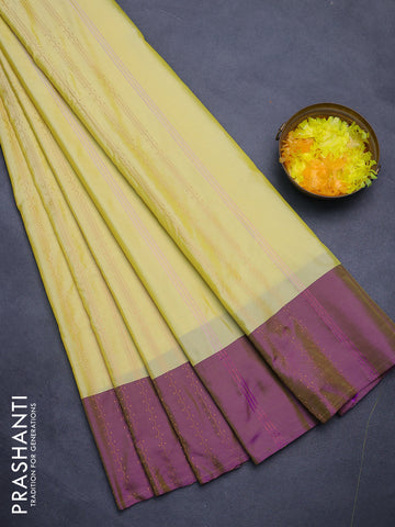 Arani semi silk saree pale yellow and purple with allover copper zari weaves and zari woven border