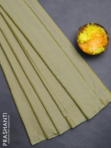 Arani semi silk saree elaichi green with allover copper zari weaves in borderless style