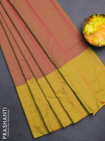 Arani semi silk saree dual shade of pinkish green and lime yellow with allover copper zari weaves and zari checked border