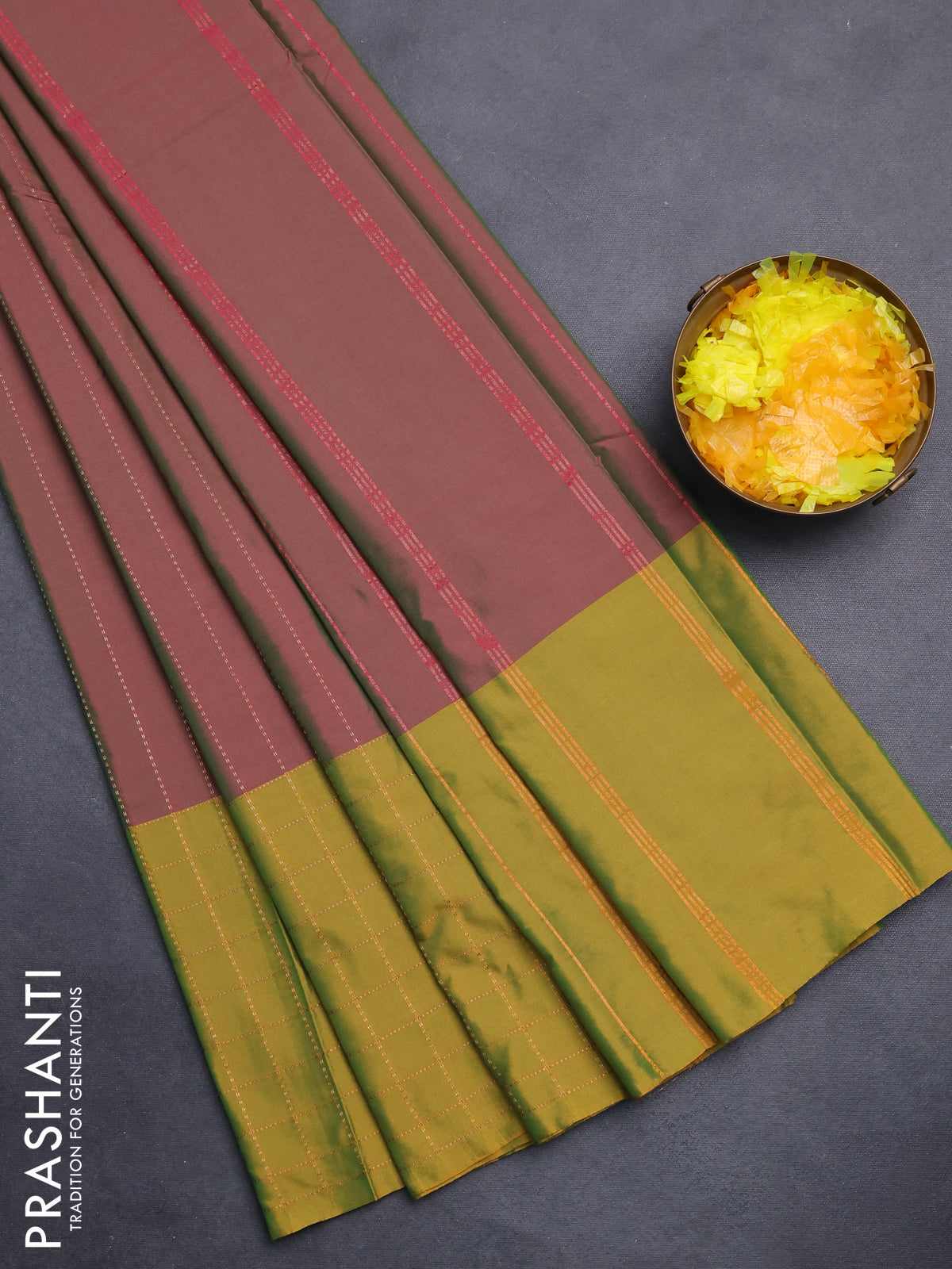 Arani semi silk saree dual shade of magenta pink and mustard green with allover copper zari weaves and zari checked border