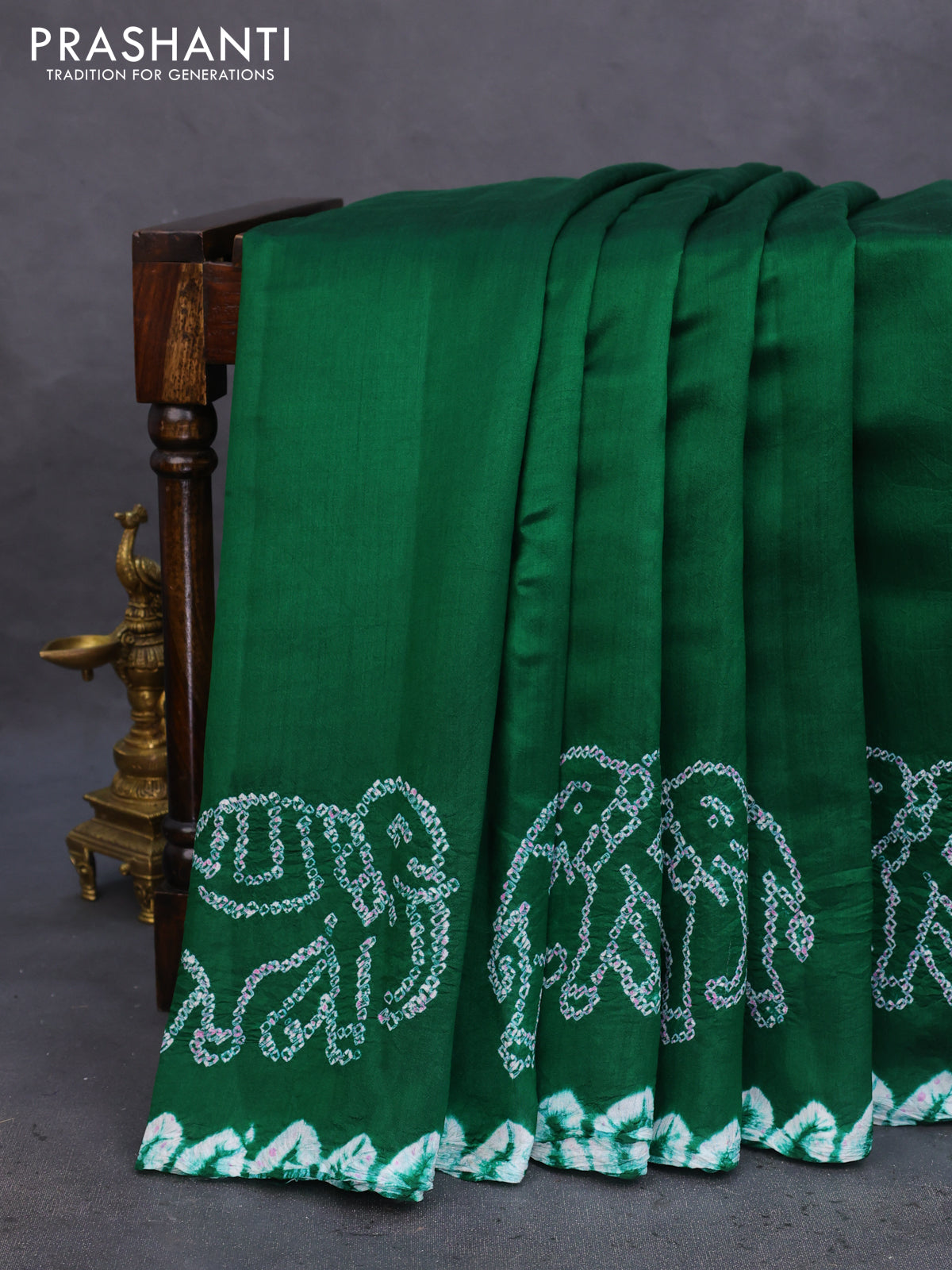 Chiniya silk saree green with allover bandhani prints
