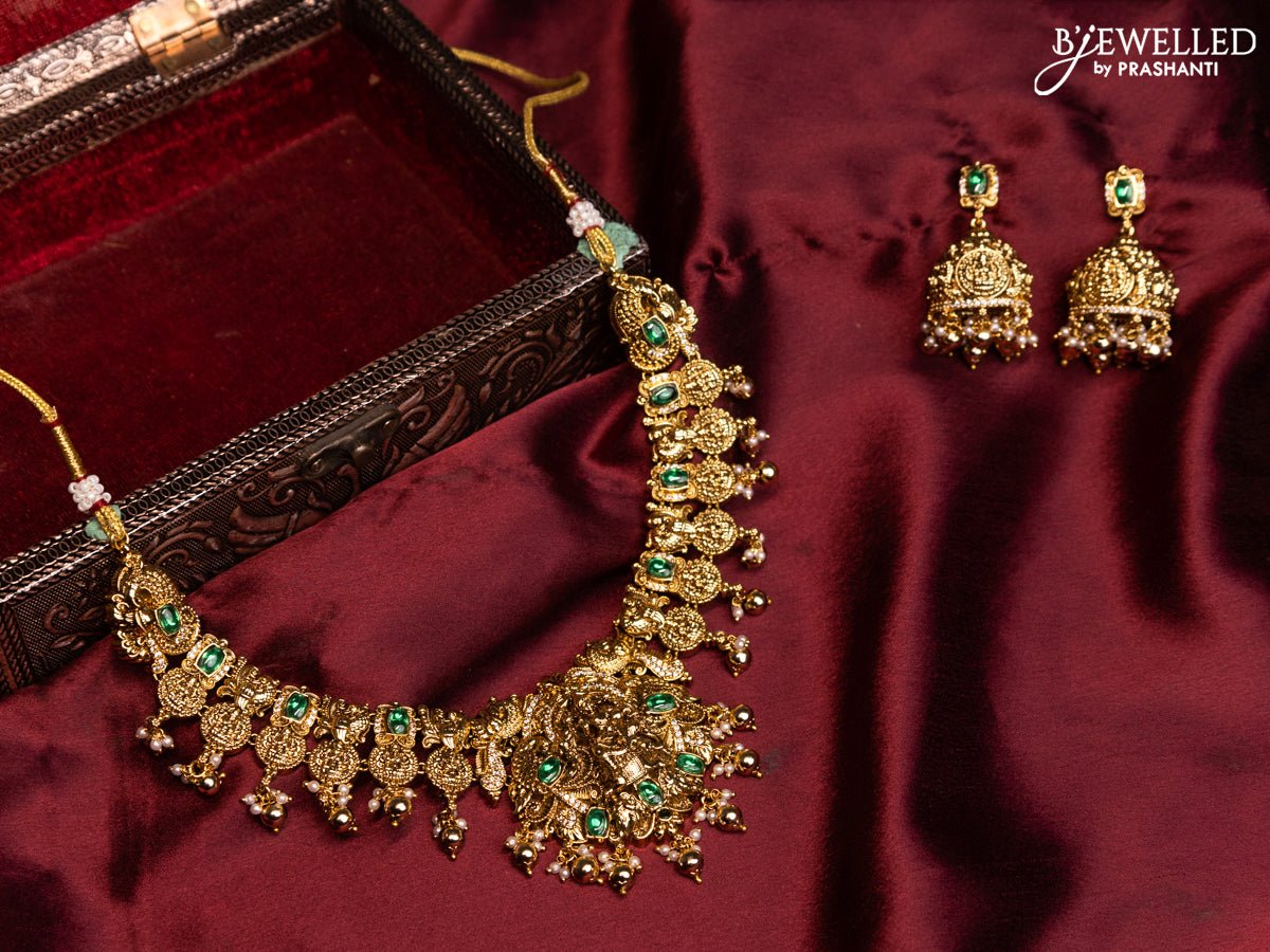 Antique necklace lakshmi design with emerald & cz stones and golden beads hangings