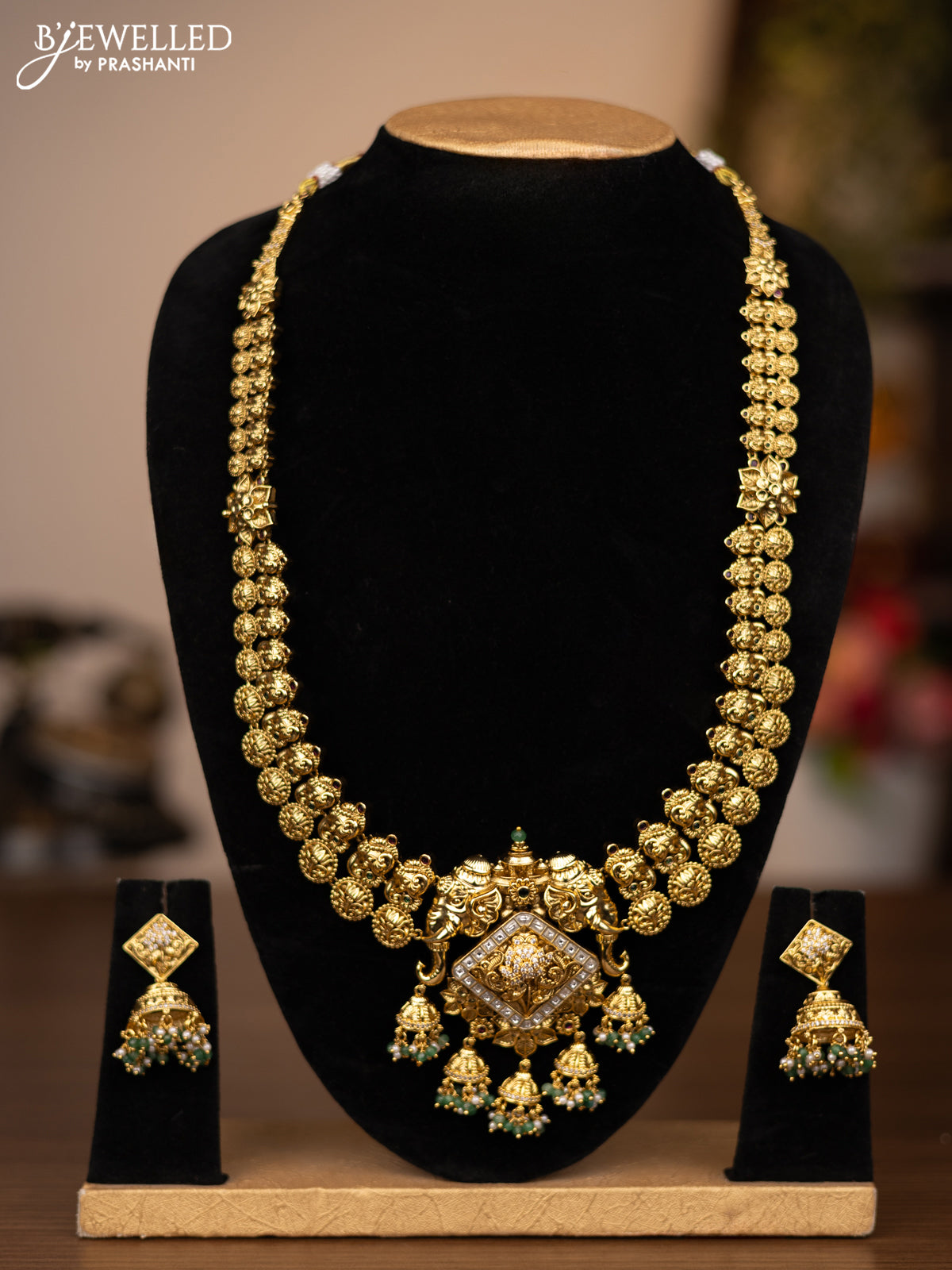 Antique haaram elephant design with jadau kundan stones and green beads hanging
