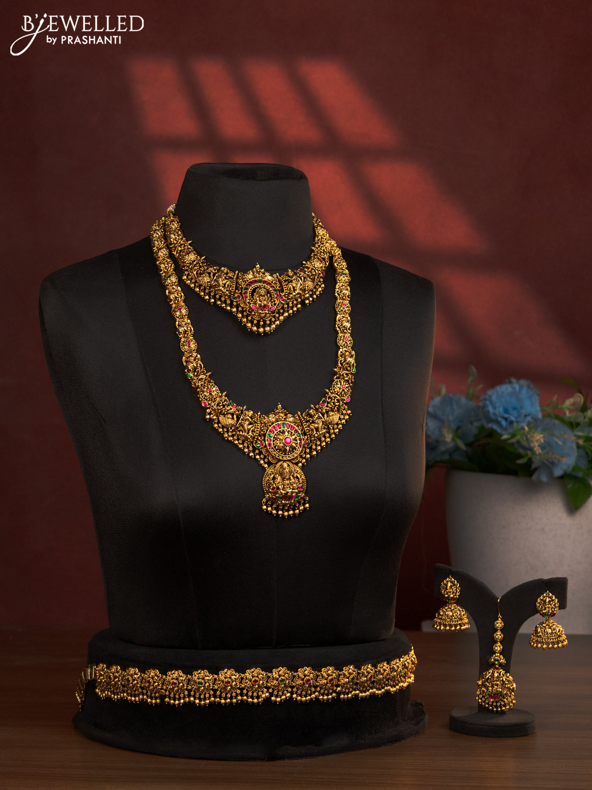 Antique bridal set lakshmi design with jadau stones and golden beads hanging