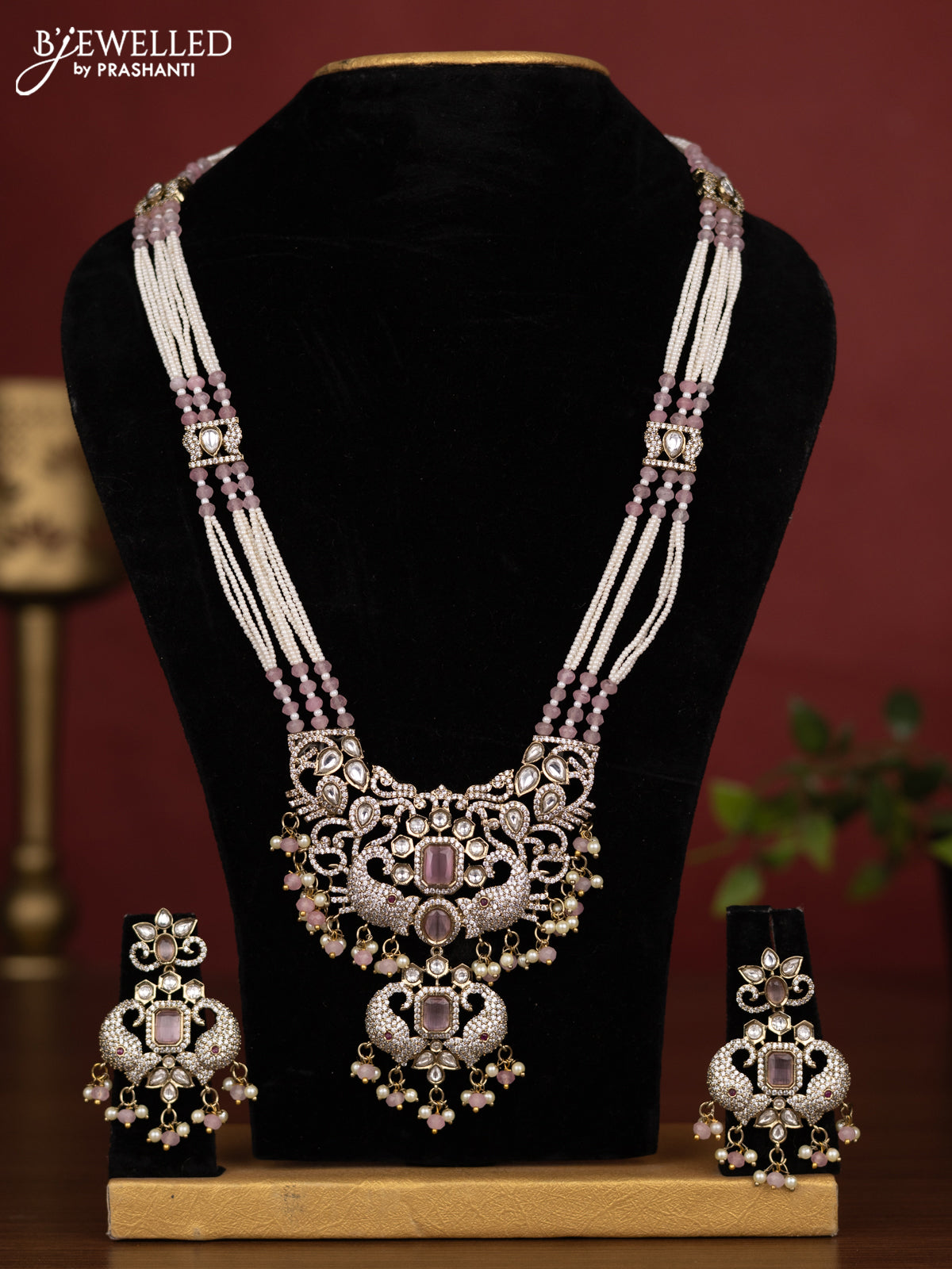 Beaded triple layer baby pink necklace with kundan & cz stones and pearl & beads hanging in victorian finish