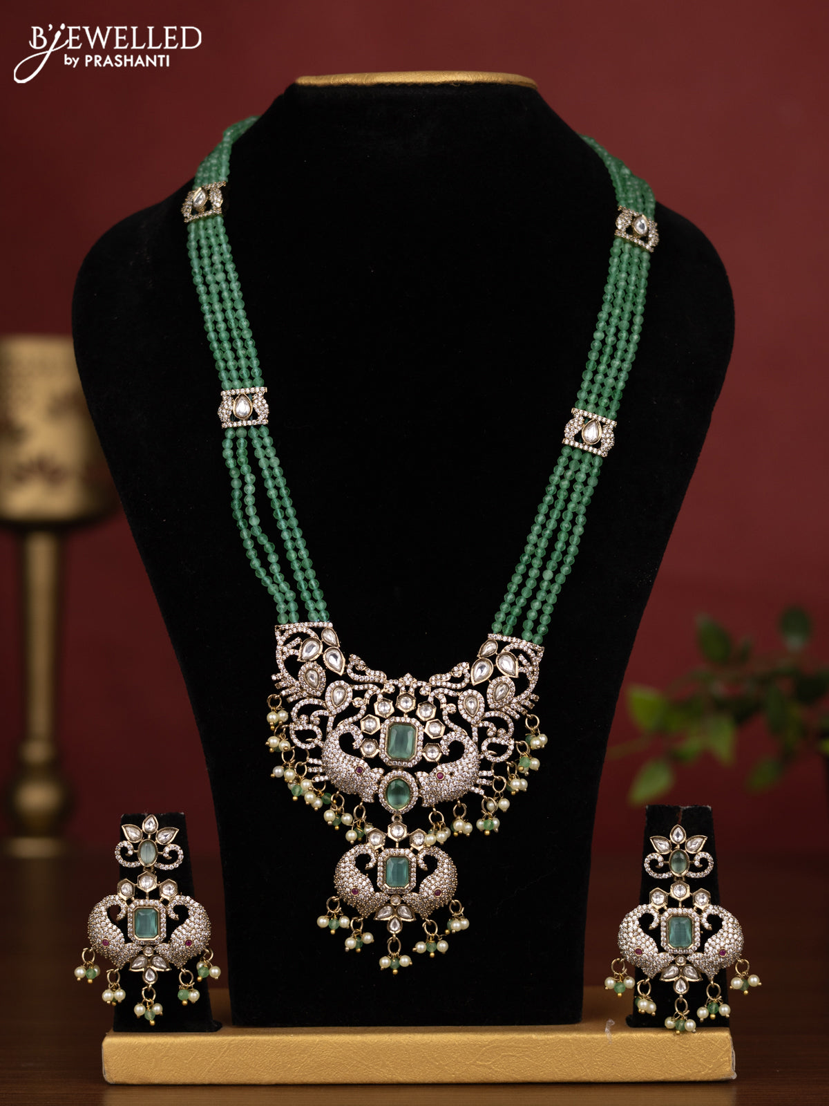 Beaded triple layer mint green necklace with kundan & cz stones and pearl & beads hanging in victorian finish