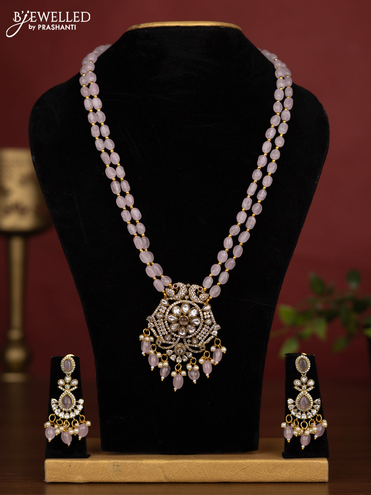 Beaded triple layer baby pink necklace peacock design with kundan & cz stones and pearl & beads hanging in victorian finish