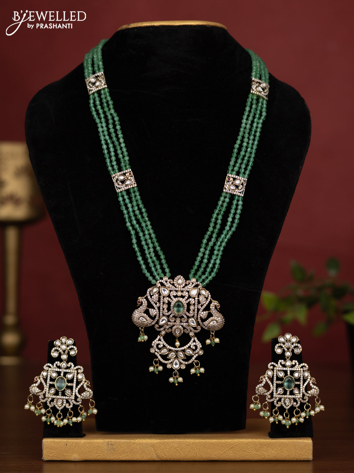 Beaded multilayer mint green necklace with kundan & cz stones and pearl & beads hanging in victorian finish