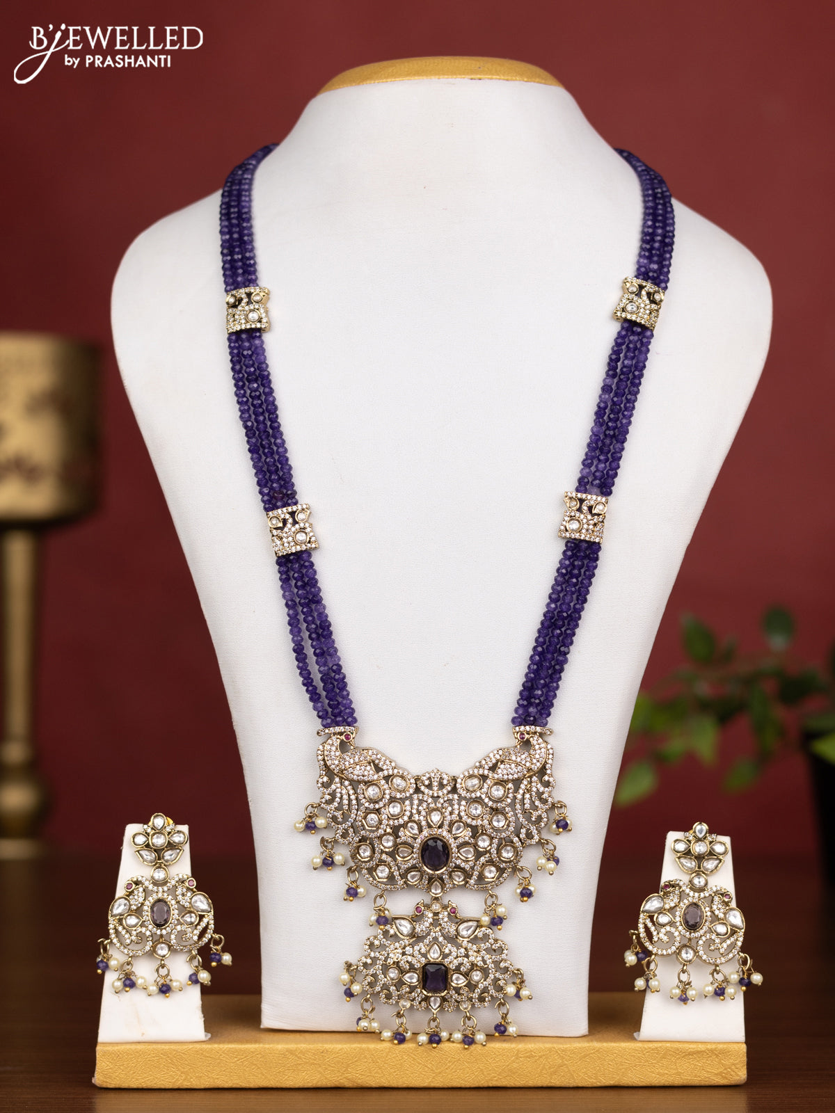 Beaded triple layer violet necklace peacock design with kundan & cz stones and pearl & beads hanging