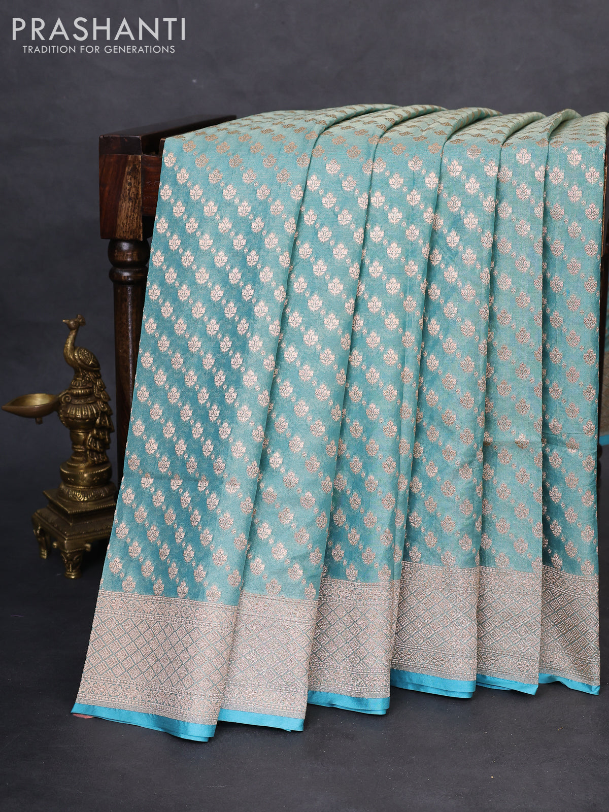 Banarasi tissue silk saree teal blue with allover zari woven brocade weaves and zari woven border