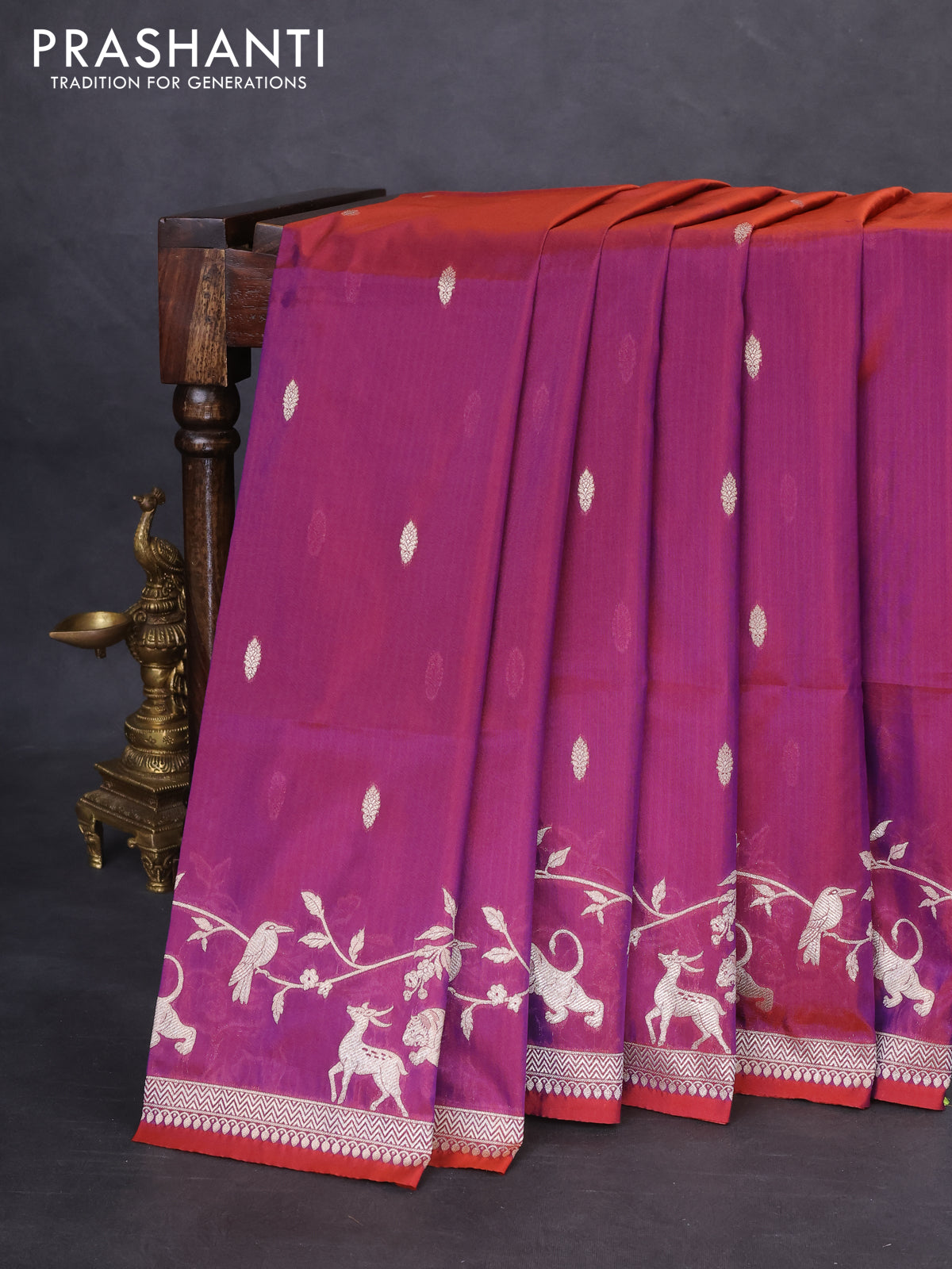 Banarasi semi katan silk saree dual shade of maroonish purple with allover zari woven buttas and rich zari woven border