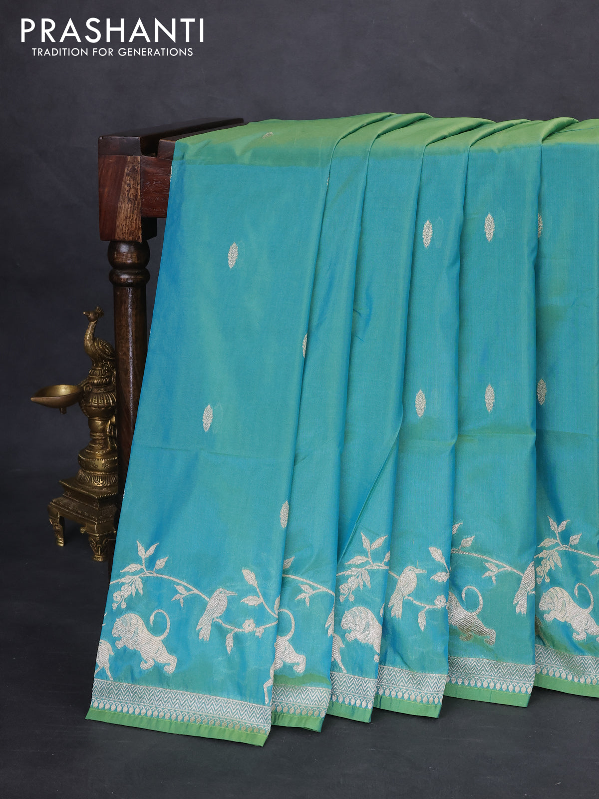 Banarasi semi katan silk saree dual shade of teal bluish green with allover zari woven buttas and rich zari woven border