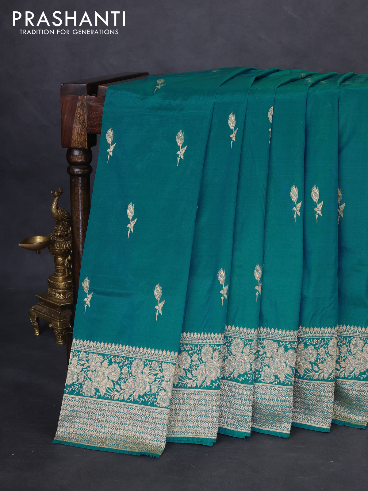 Banarasi semi katan silk saree dual shade of teal bluish green with floral zari woven buttas and zari woven border