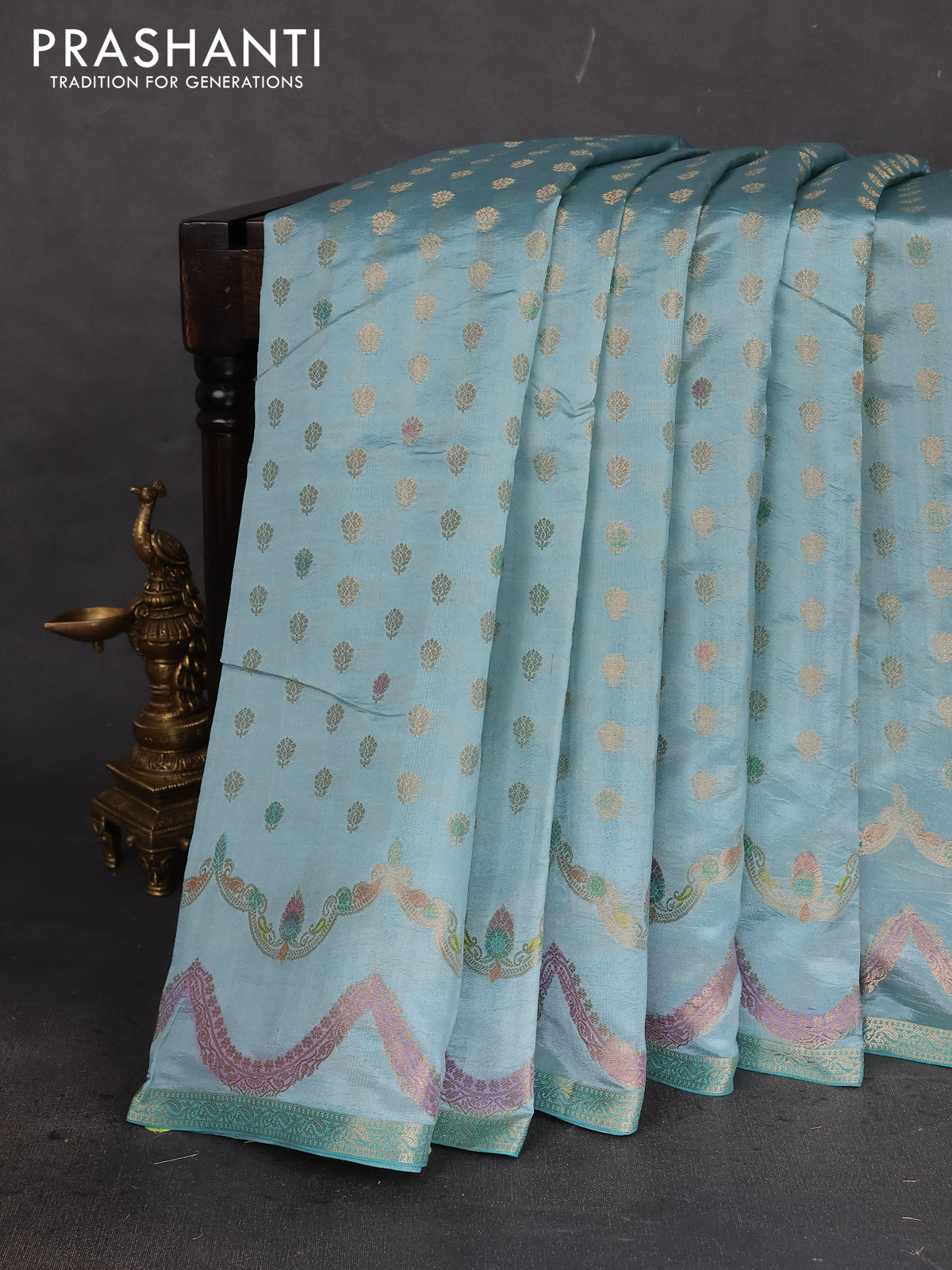 Chiniya silk saree pastel blue with allover zari woven buttas and zari woven border