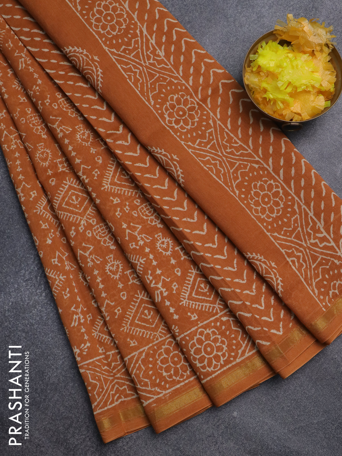 Chanderi bagru saree dark mustard with allover warli prints and small zari woven border