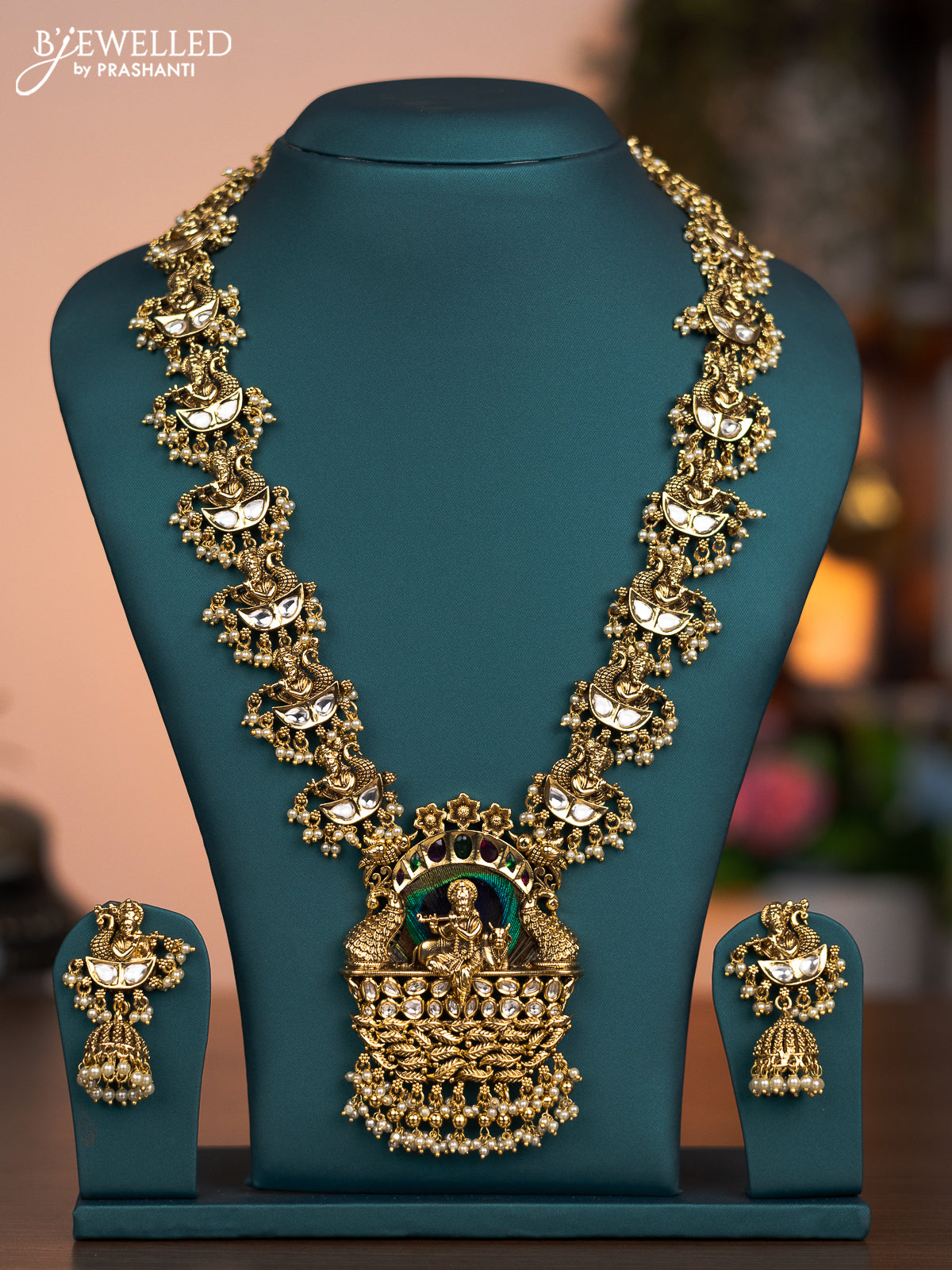 Jadau haaram peacock feather krishna pendant with jadau kundan stones and pearl hanings