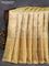 Pure kanjivaram tissue silk saree gold with allover zari woven brocade weaves and long zari woven border