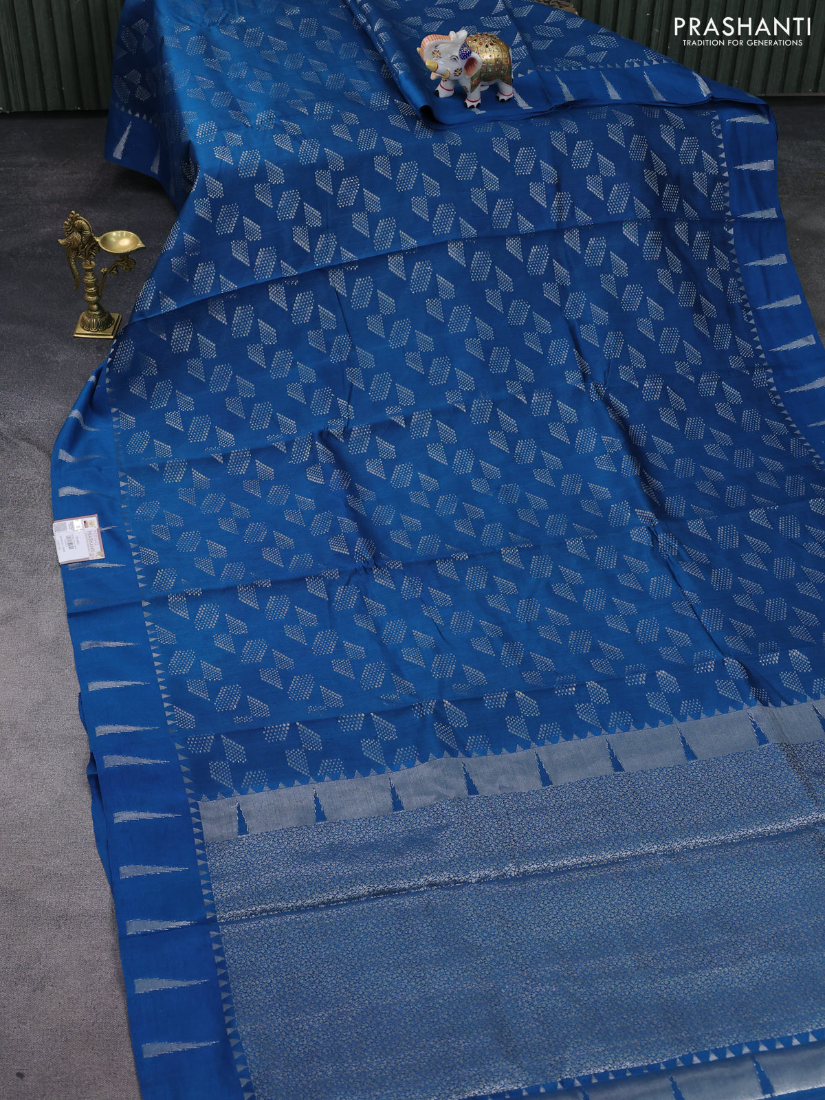 Chiniya silk saree cs blue with allover silver zari weaves and temple design zari woven border