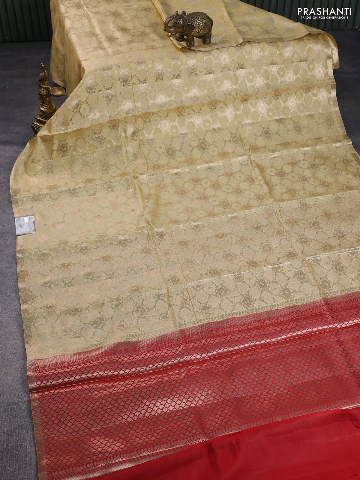 Chiniya silk saree pale yellow and red with allover zari woven brocade weaves and zari woven border
