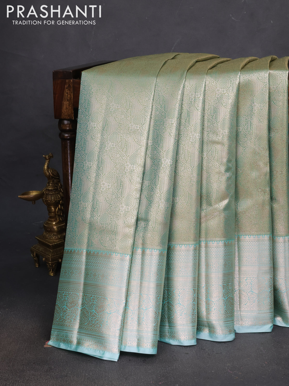 Bangalori tissue silk saree teal shade with allover zari woven brocade weaves and zari woven border