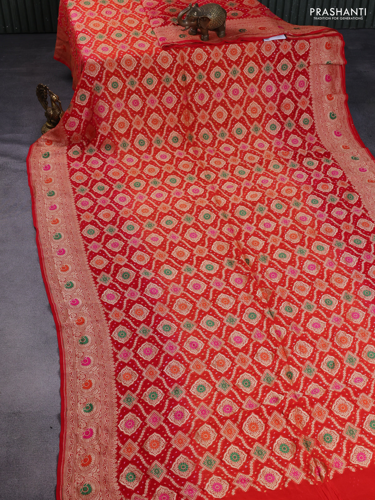 Banarasi georgette saree orange and red with bandhani prints & mina weaves and woven border
