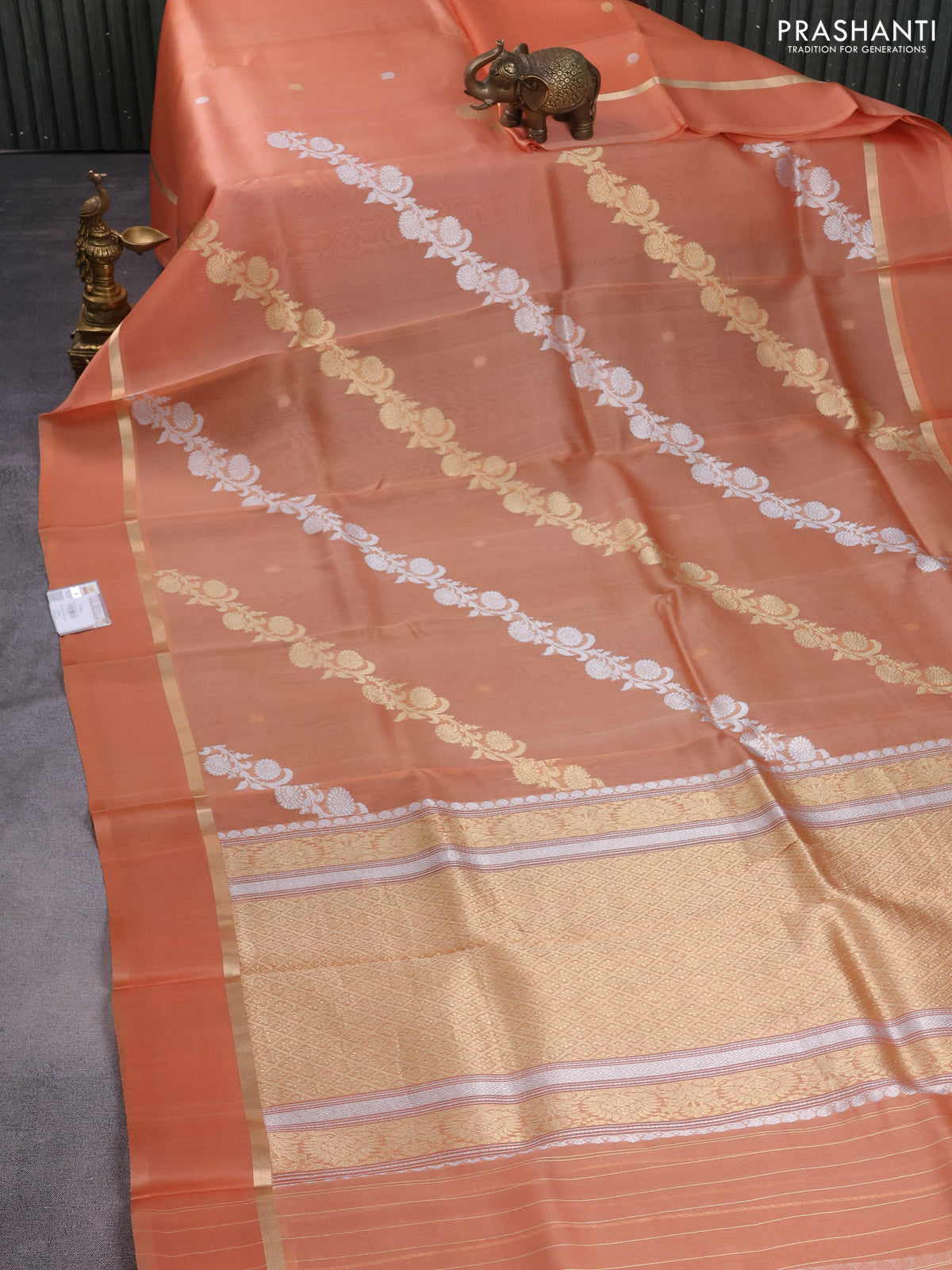Banarasi organza silk saree pale orange with silver & gold zari weaves and zari woven simple border