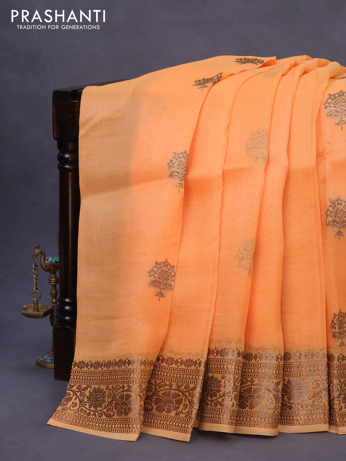 Banarasi organza silk saree pale orange with thread & zari woven buttas and banarasi style border