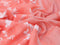 Pure linen saree peach orange with allover floral prints and silver zari woven piping border