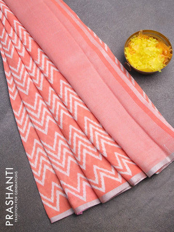 Pure linen saree peach orange with allover zig zag prints and silver zari woven piping border