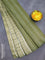 Bamboo silk saree elaichi green and sap green with allover tie & dye prints & thread stripe pattern and sequin work pallu